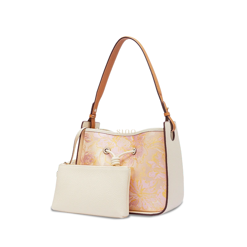 Chinoiserie leather shoulder bag for women with Peony Dream Shu Brocade and matching pouch, angled front view.