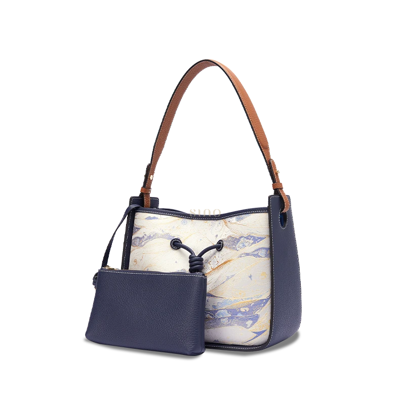 Chinoiserie leather shoulder bag for women with Moonlit Splendor Song Brocade and matching pouch, angled front view.