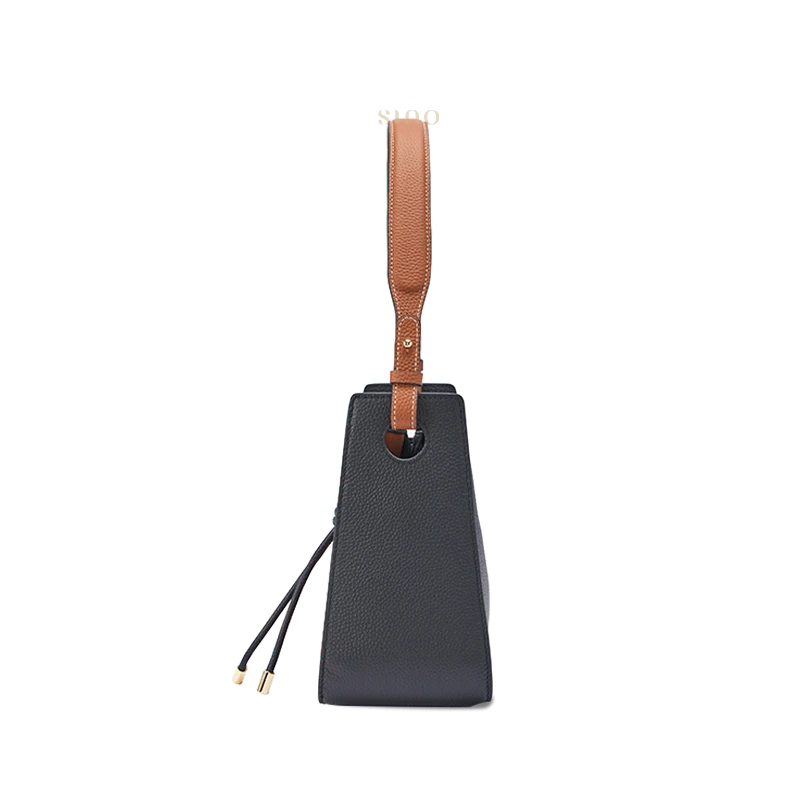 Peacock Prosperity large leather shoulder bag side view showing the structured black silhouette and shoulder strap.