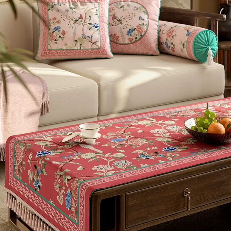 Close-up of Chinoiserie blossom pattern on tablecloth.