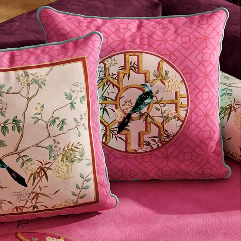 Detailed embroidery of chinoiserie window lattice birds blossoms.