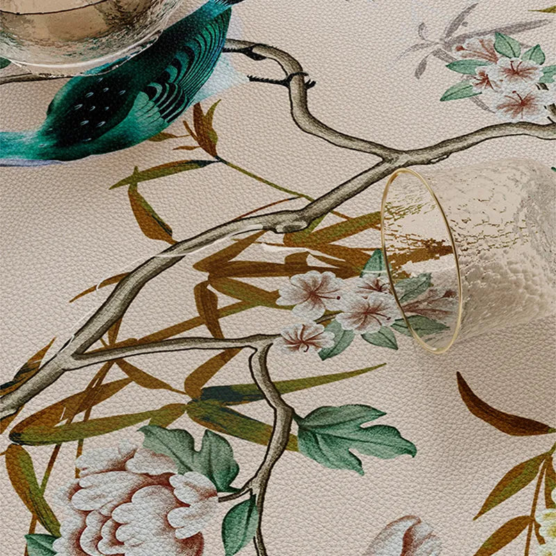 Wiping spill from chinoiserie table mat, easy clean.