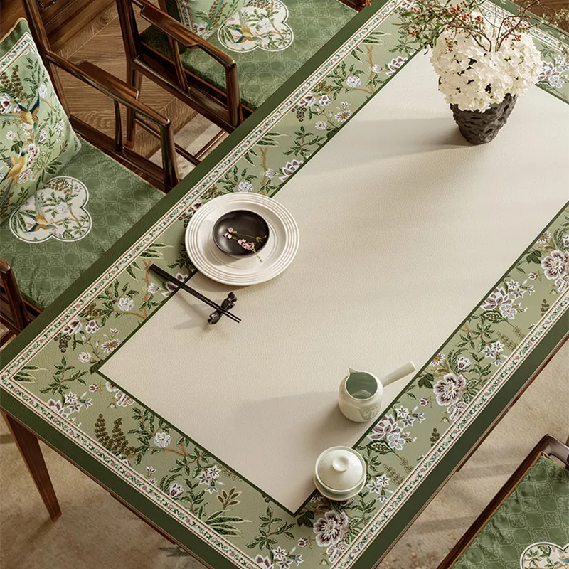 Left detail of chinoiserie table mat with dining set.
