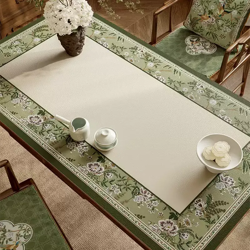 Right detail of floral leather table mat with dining set.