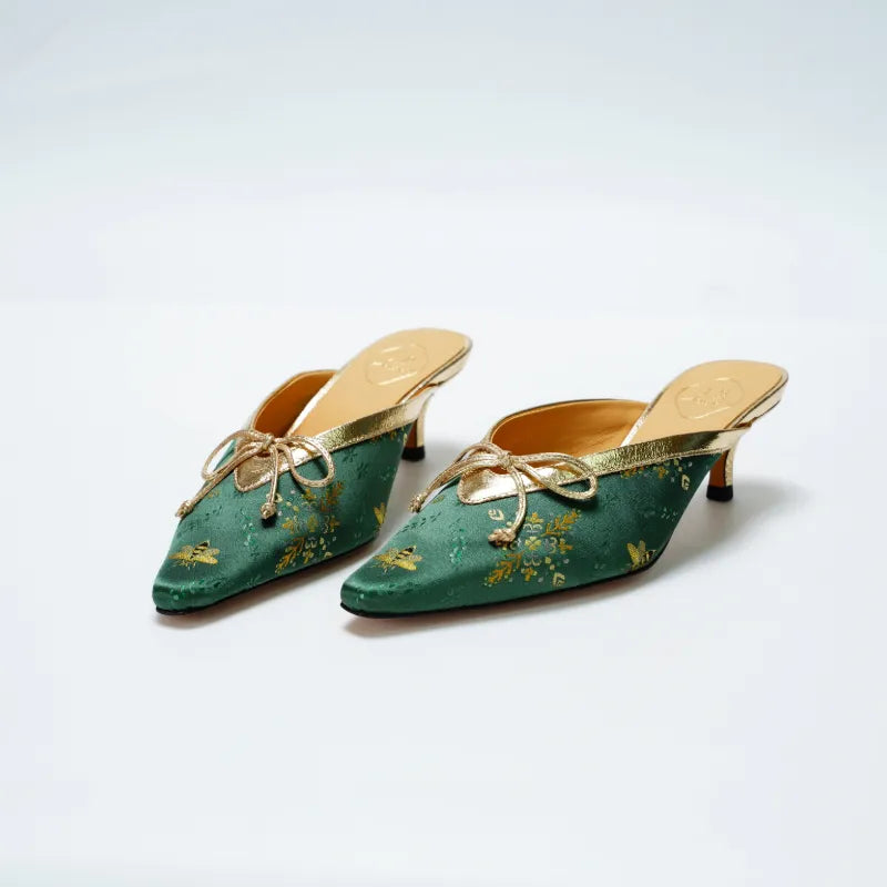Emerald Shu Brocade kitten heel mules featuring gilded butterfly motifs and elegant pointed toe design.