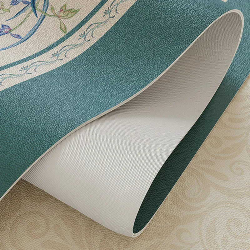 Flexible blue leather nightstand mat with anti-slip backing.