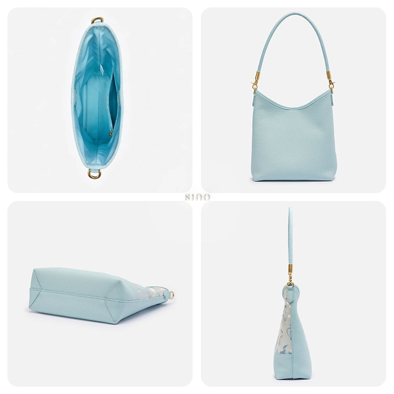 Interior, light blue leather back, structured base, and side profile of the Golden Jade Romance shoulder bag.