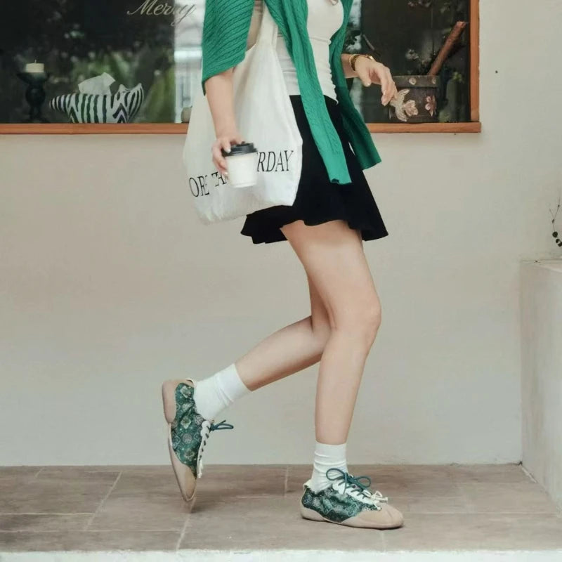 Jade Green Shu Brocade ballet sneakers for women captured in a lifestyle scene, highlighting comfort, elegance, and Oriental-inspired design.