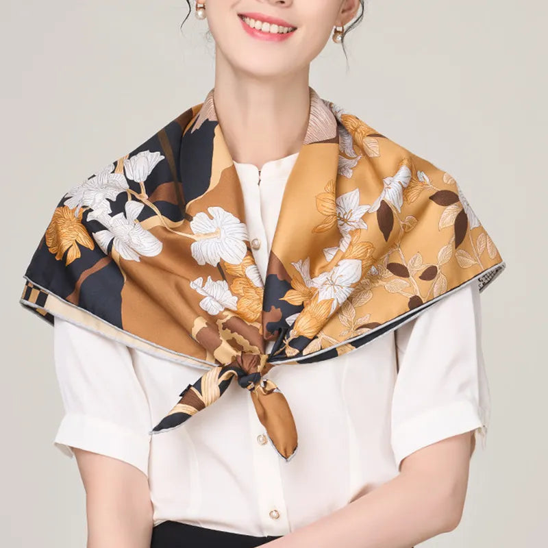 Chinese magnolia scarf elegantly knotted on shoulders.