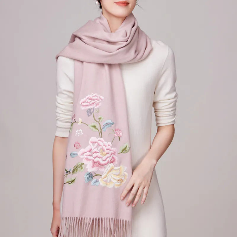 Luxury chinoiserie embroidery wool cashmere scarf in light pink, hydrangea peony pattern, single strand drape on model.