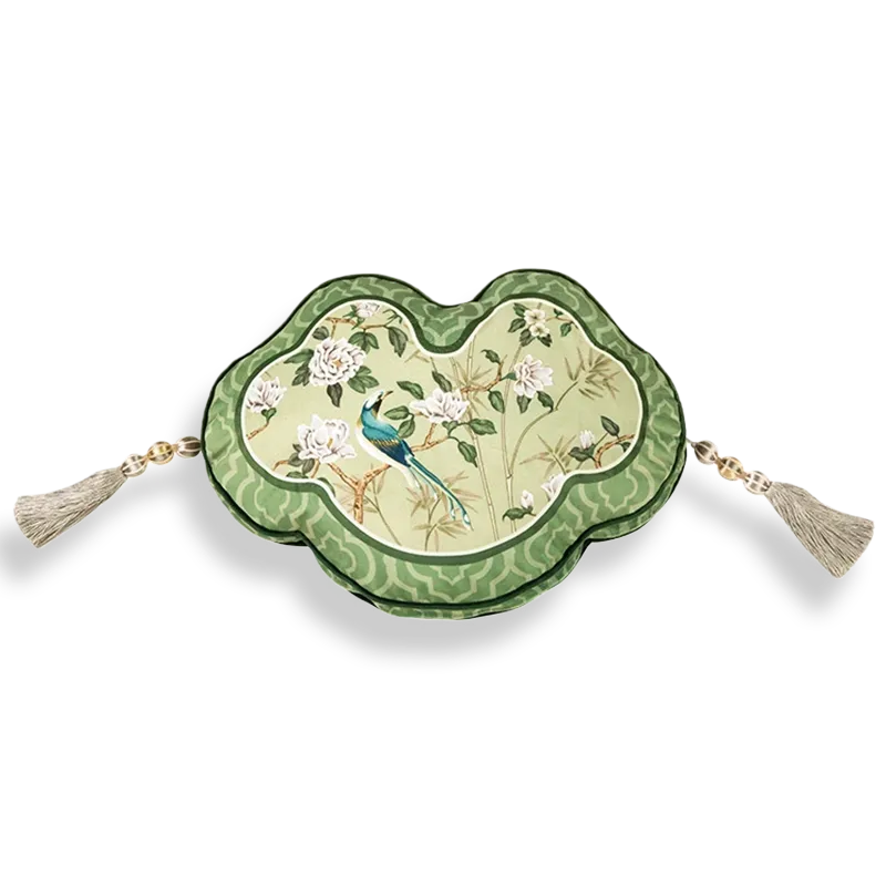 Heart-lock shaped luxury chinoiserie jade green decorative throw pillow on white background.