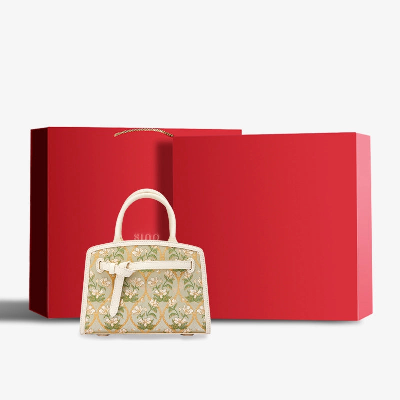 Luxury Dayun Brocade Verdant Floral Large Leather Top Handle Bag displayed with premium red gift box packaging.
