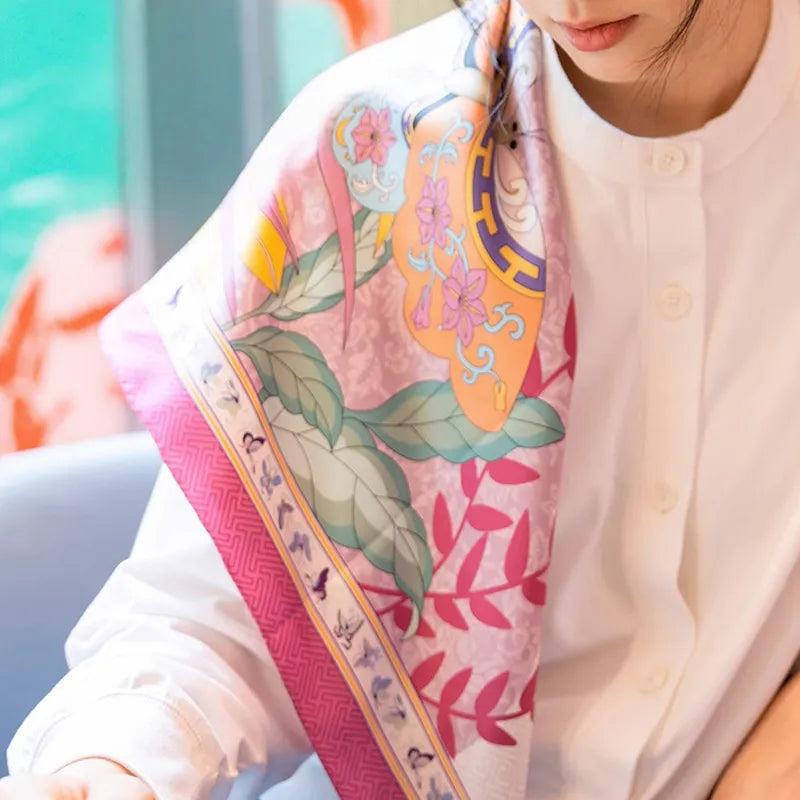 Close-up of the Luxury Nanjing Brocade Garden Rabbit silk square scarf with floral, butterfly, and chinoiserie pattern details.