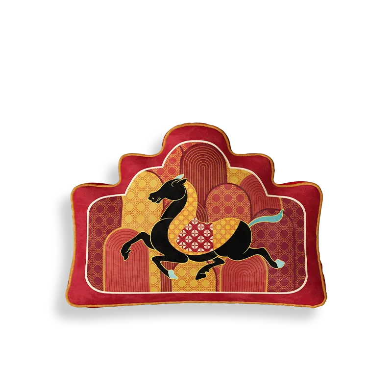 Red chinoiserie lumbar pillow with fortune horse design on white background.