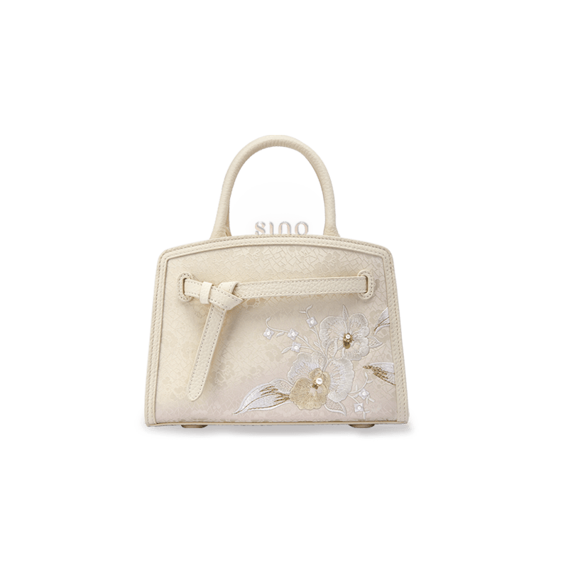 Updated front view of the Luxury Shuanglin Silk Orchid Butterfly Embroidered Leather Top Handle Bag, featuring an ivory structured shape, delicate silk embroidery, and leather trim.