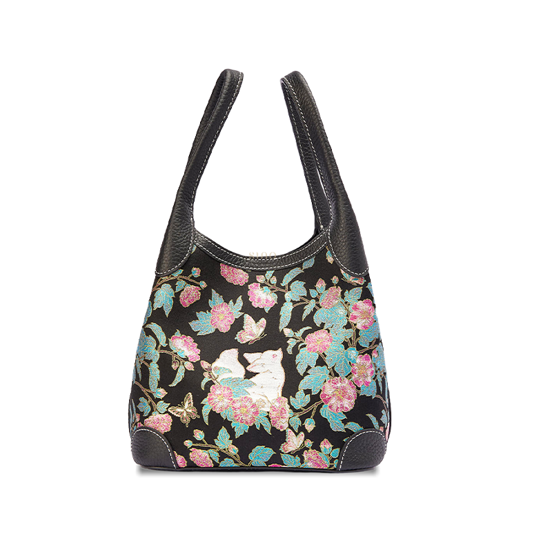 Front view of the Luxury Song Brocade Butterfly and Auspicious Fox Basket Tote Bag, featuring a black brocade body with fox, butterfly, and floral motifs.