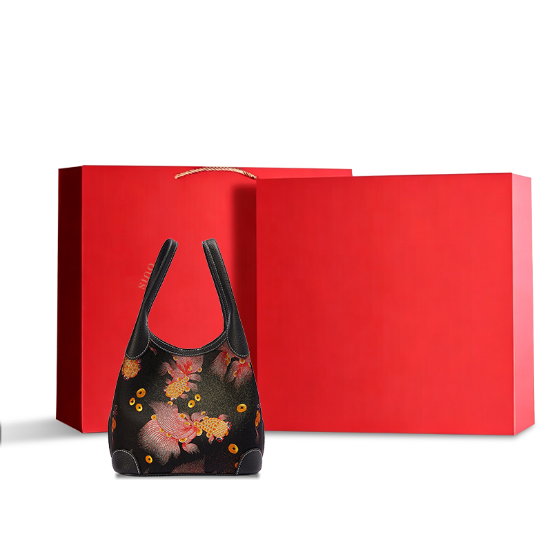 Chinoiserie Luxury Song Brocade Golden Carp Leather Basket Tote Bag displayed with a red gift box, ideal for premium gifting and elegant retail presentation.