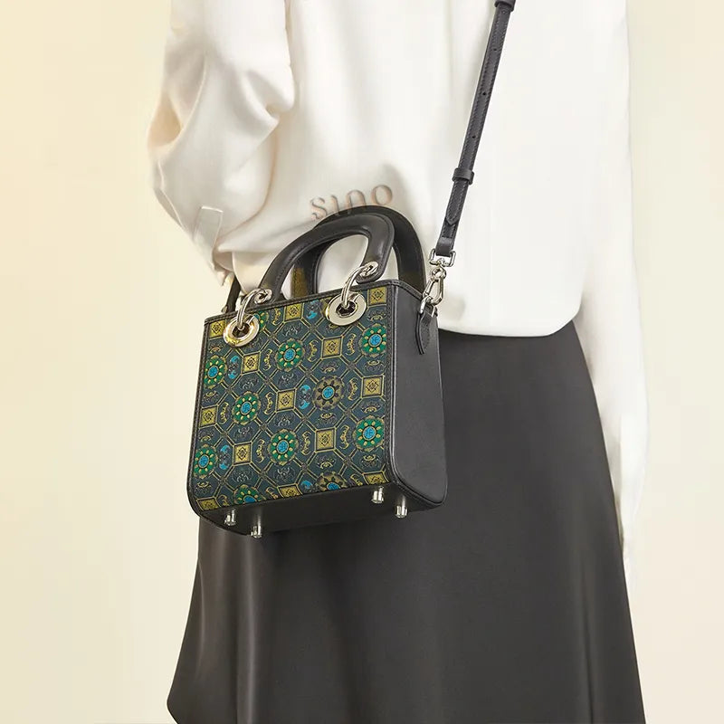 Luxury Song Brocade Lotus and Auspicious motif mini bag styled with a shoulder strap.