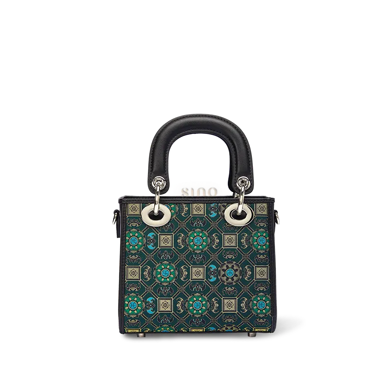 Luxury Song Brocade Lotus and Auspicious motif mini crossbody bag with black leather trim front view.