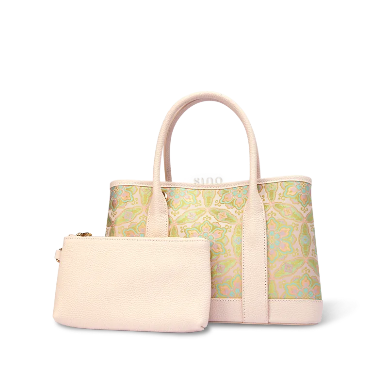 Front view of luxury Song brocade pink Baoxiang floral motif tote bag with inner pouch on white background.