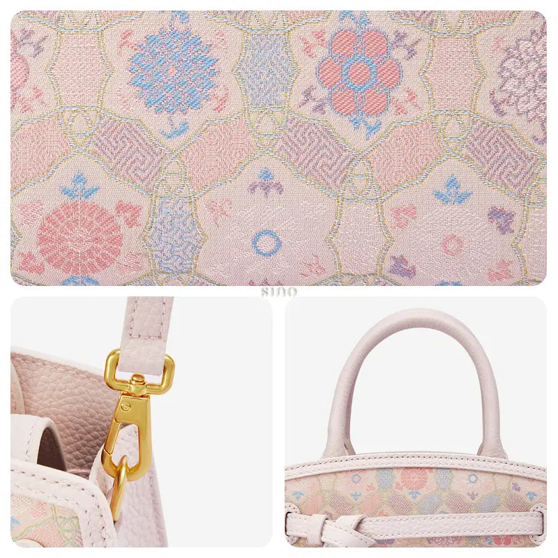 Close-up detail of the Luxury Song Brocade Ruyi Longevity Motif Leather Top Handle Bag highlighting the ruyi longevity motif, gold-tone hardware, and top handle.