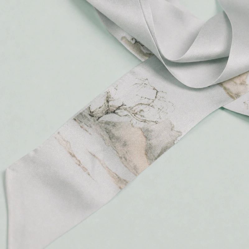 Close-up of the Chinese Misty Landscape print on smooth mulberry silk Twilly scarf.