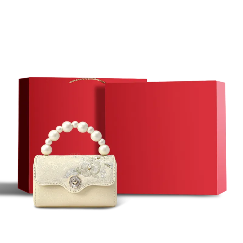 Red gift box for orchid butterfly handbag.