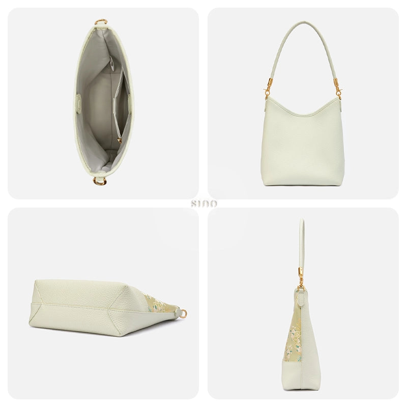 Interior, pale green leather back, structured base, and side profile of the Ruyi Blossom shoulder bag.