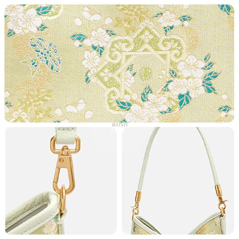 Close-up of the Ruyi Blossom Song Brocade motif with white flowers, turquoise details, leather strap, and gold-tone hardware.