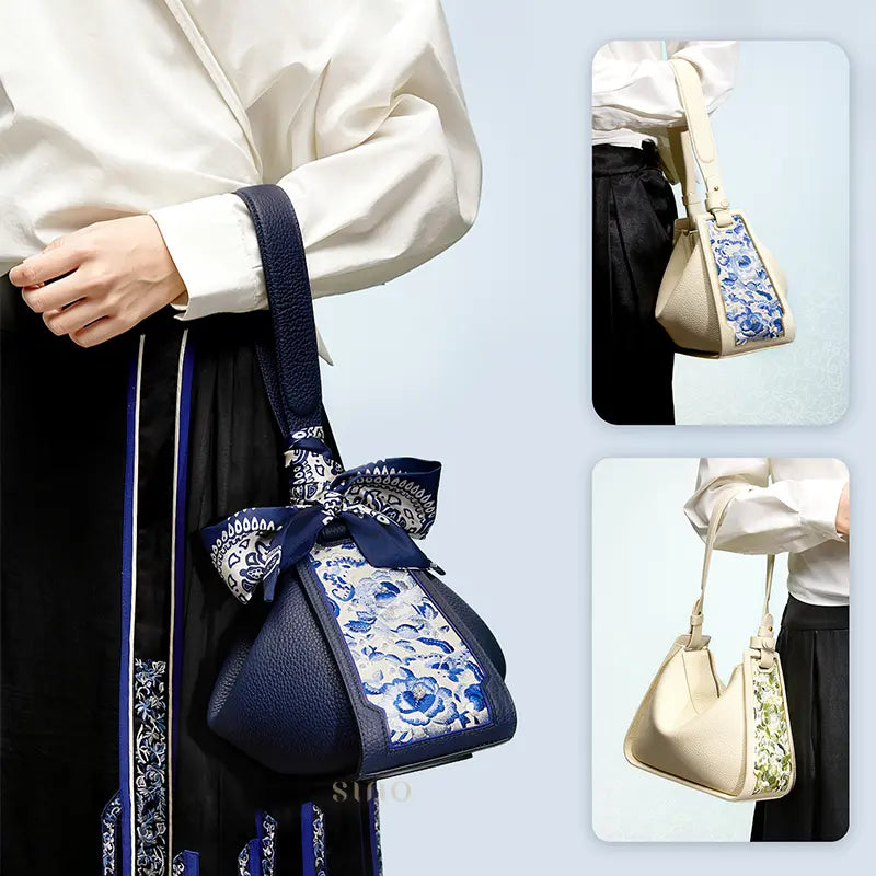 SANLAN embroidered blue floral panel blue leather shoulder bag styled with a modern Chinese-inspired outfit.