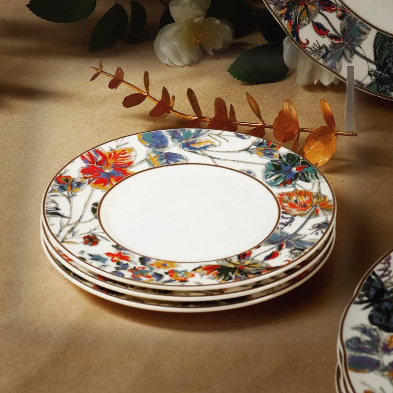 Three stacked bone china saucers (45-degree view).