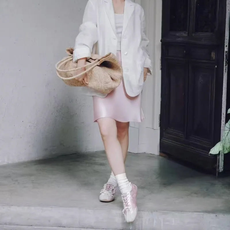 Women's Shu Brocade ballet sneakers paired with modern casual fashion and Chinese-inspired styling.