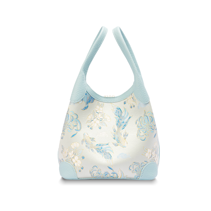 Front view of the Luxury Shu Brocade Golden Fish & Flower Leather Basket Tote Bag, featuring a light blue leather trim and delicate golden fish and floral brocade motif.
