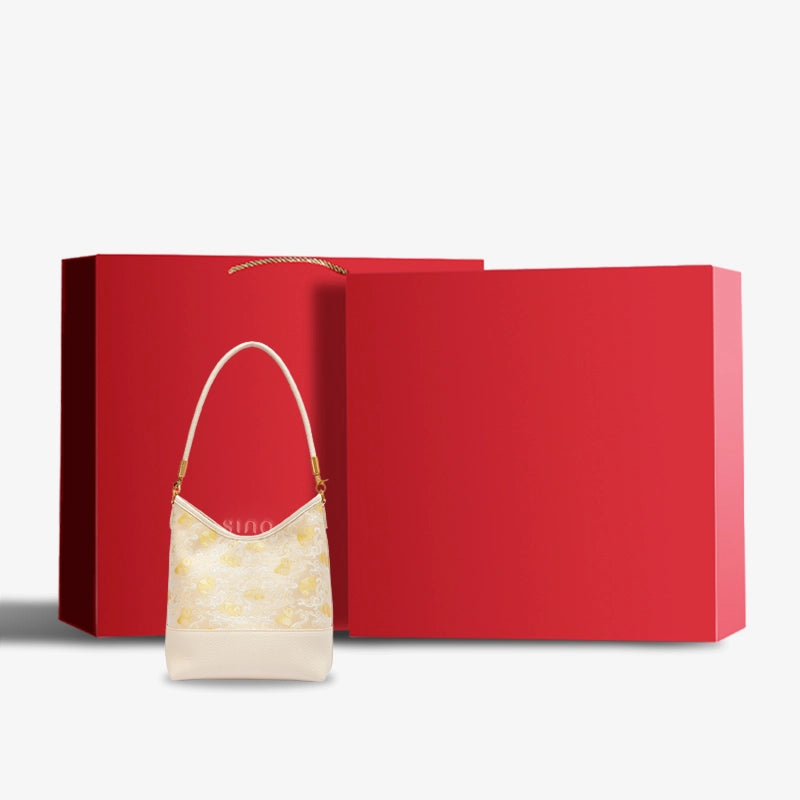 Chinoiserie Luxury Shu Brocade Panda and Dragon Leather Shoulder Bag displayed with elegant red gift box packaging.