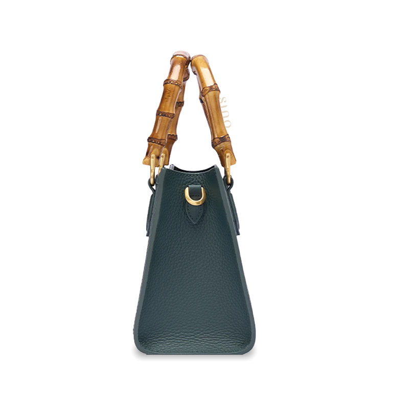 Side view of Shu Brocade Panda bamboo handle handbag showing structured silhouette and premium leather construction.