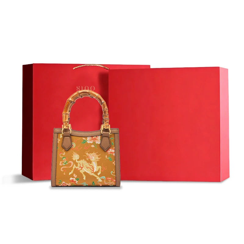 Shu Brocade Qilin bamboo handle handbag with elegant gift packaging for special occasions.