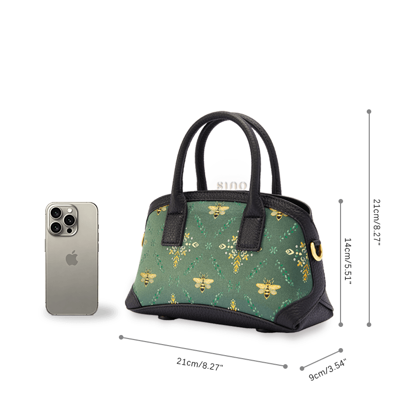 Size reference of the Luxury Shu Brocade Verdant Layers Leather Top Handle Bag beside a smartphone.