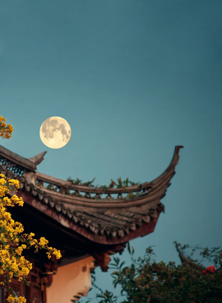 Mid-Autumn homepage banner with full moon, yellow flowers, and ancient architecture—symbolizing family reunion.