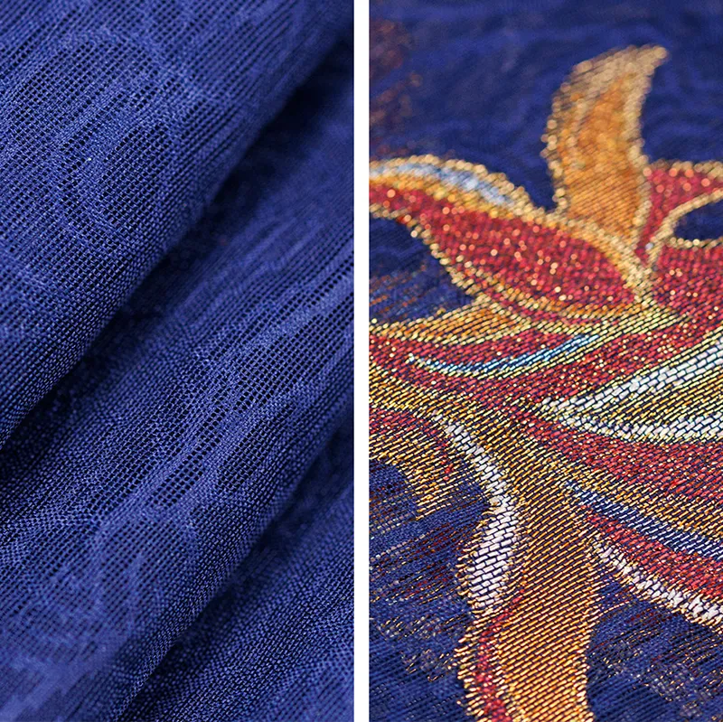Close-up comparison of fine blue silk weaving and intricate gold-thread fish details on the Nanjing Yunjin brocade shawl.