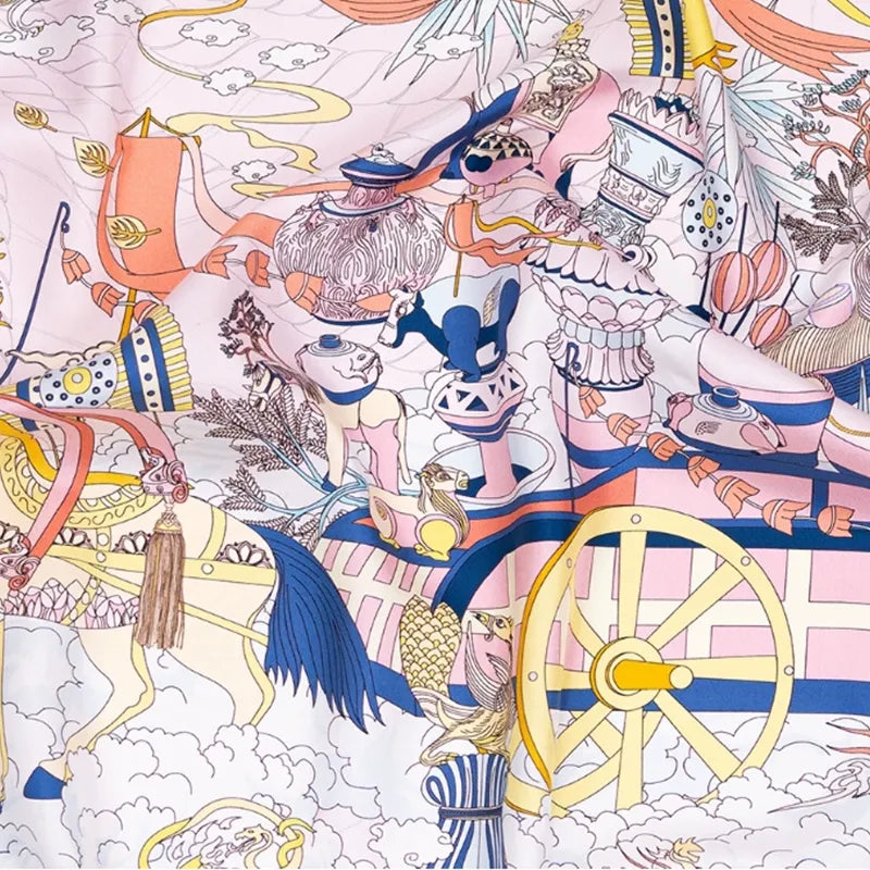 Detailed pattern view of the Six Dynasties Elegance mulberry silk large square scarf, featuring a decorative carriage, ceramics, and cloud-inspired Chinese motifs in soft pink tones.