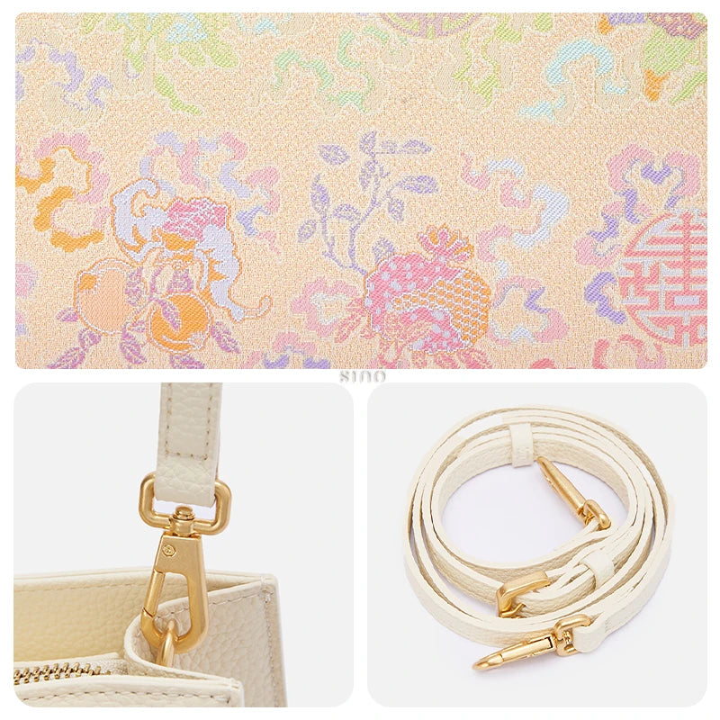 Close-up of Song Brocade auspicious Fortune and Longevity motif, gold hardware clasp, and leather shoulder strap details.