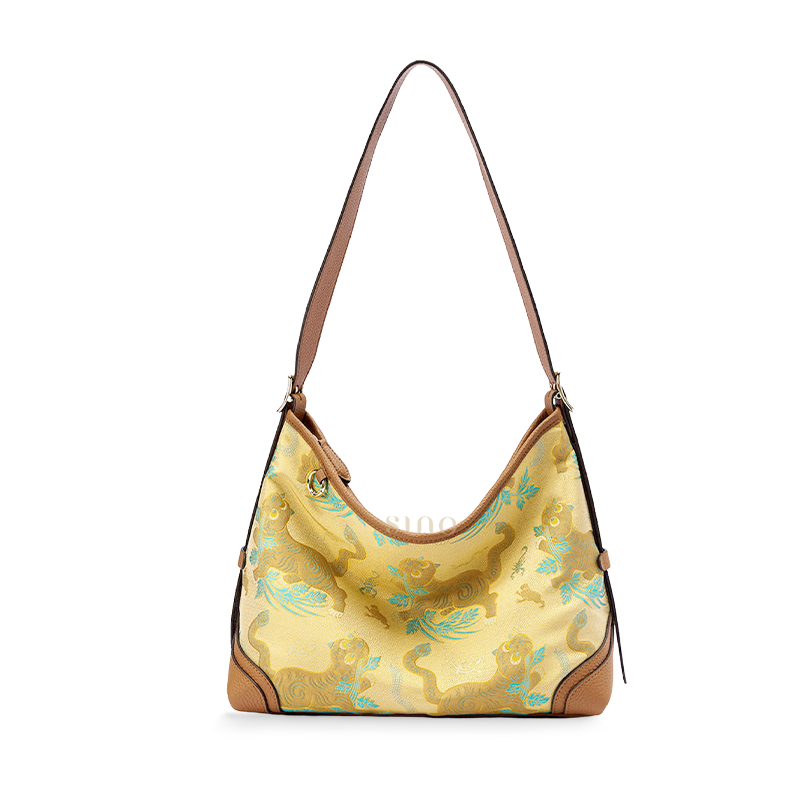 Front view of the Chinoiserie Luxury Song Brocade Brown Tiger Leather Crossbody Bag, featuring the brown tiger motif and leather trim.