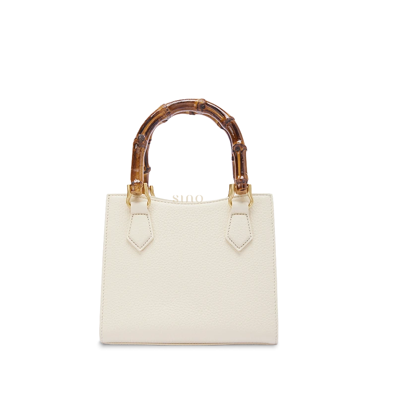 Back view of Song Brocade Fortune & Longevity bamboo handle handbag showing the smooth full-grain leather back panel and handcrafted bamboo handle.