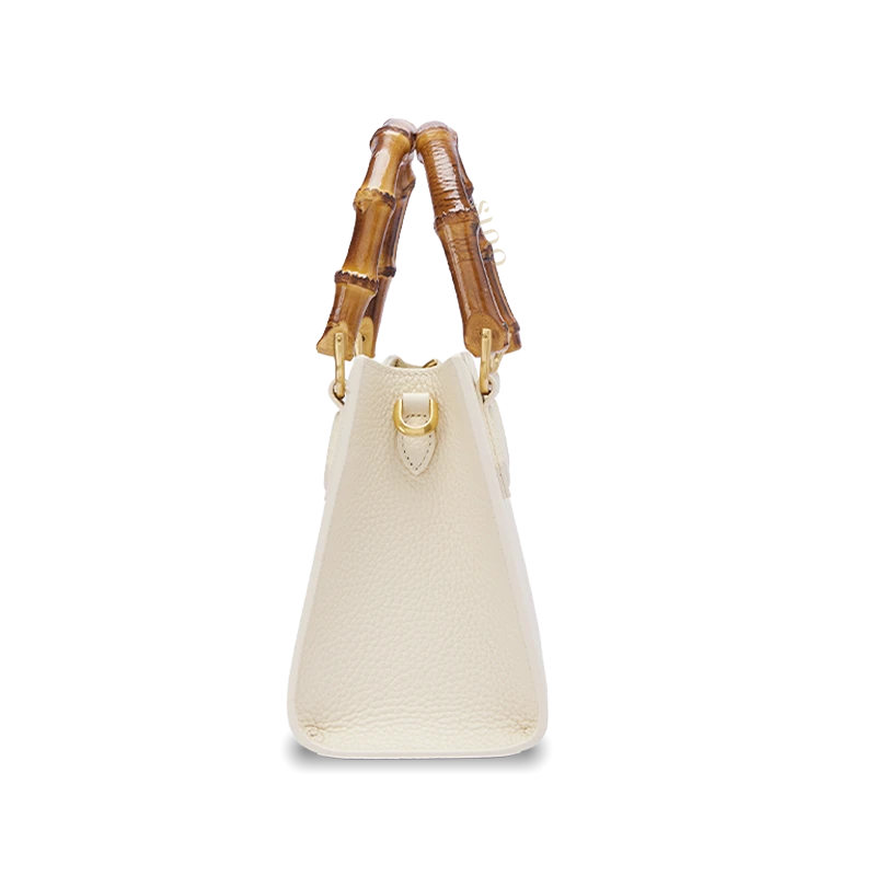 Side view of Song Brocade Fortune & Longevity handbag showing structured leather silhouette and refined handcrafted details.