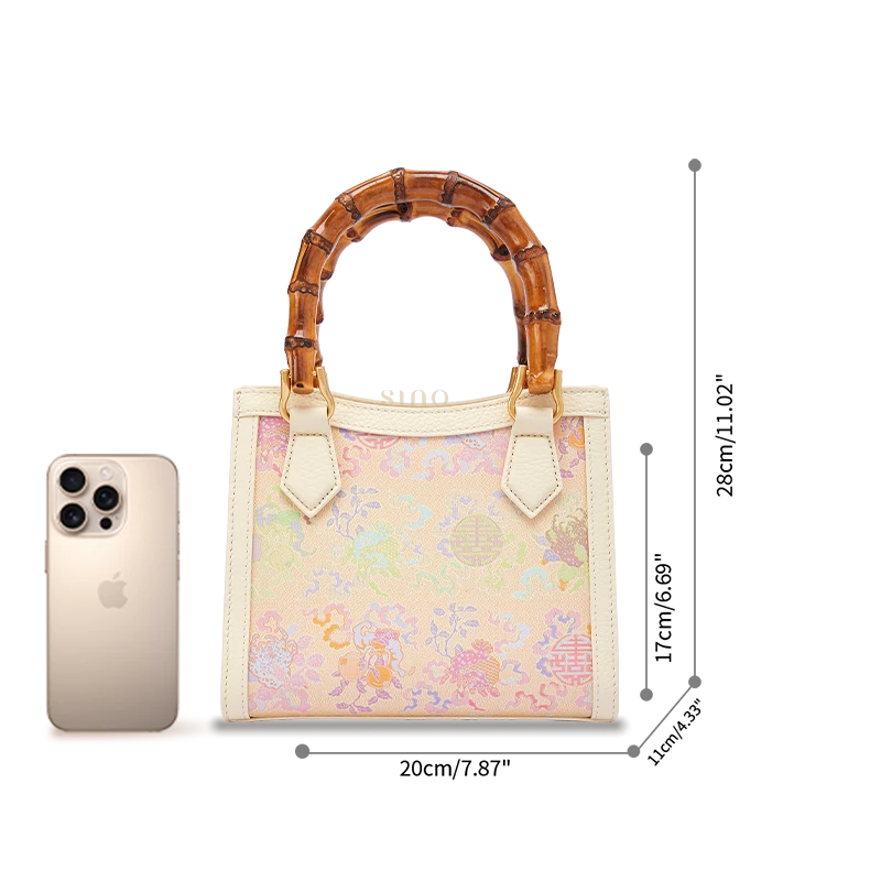 Size guide of Song Brocade bamboo handle handbag showing compact structured silhouette and everyday carrying proportions.