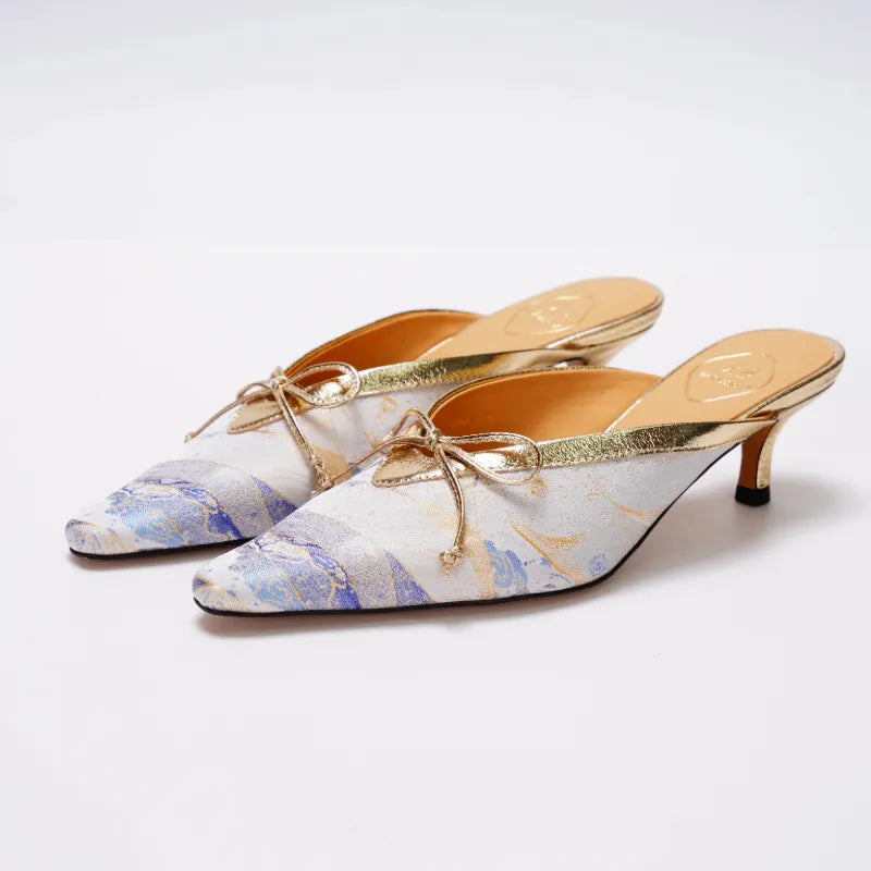 Pointed toe Song Brocade kitten heel mules with delicate bow detail and Chinese-inspired design.