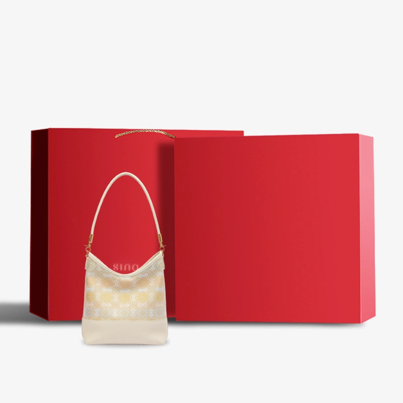 Chinoiserie Luxury Song Brocade Ruyi Victory Leather Shoulder Bag displayed with elegant red gift box packaging.