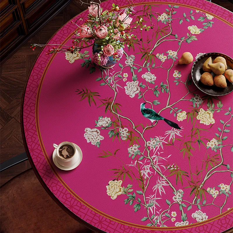 Chinoiserie table mat with pastries and vase, left top view.
