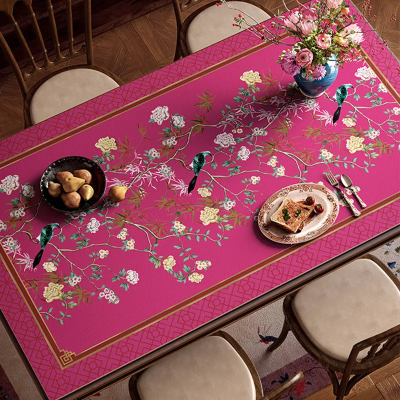 Full pink floral bird table mat top view with dining set.