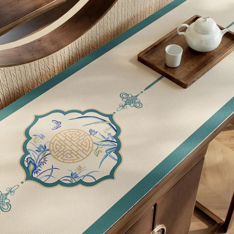 Summer blue leather cabinet mat with longevity medallion.